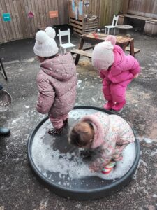 Three Children Water Play | Little Woodlands Nursery